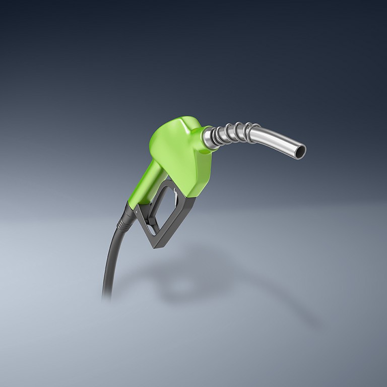 Gasoline tap on blue background